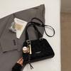 Korean version of high-value niche shoulder bag 2025 autumn new solid color fashion trend glossy underarm handbag women