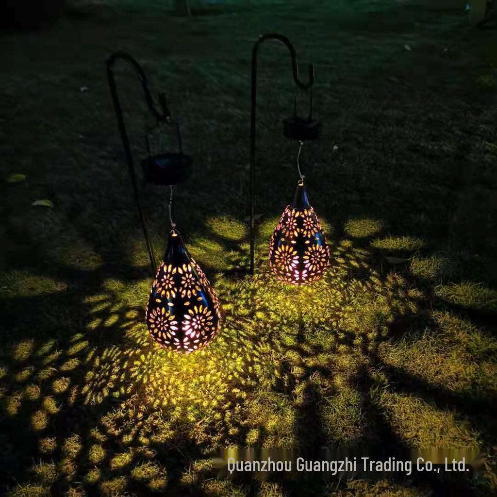 Cross-Border Iron Art Solar Lamp: Hollow Outdoor Courtyard Lawn Projection Light in Water Drop Shape