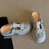 2025 new thick-soled bag head half slippers women's outer wear rivets hollow hole shoes lazy one pedal muller slippers