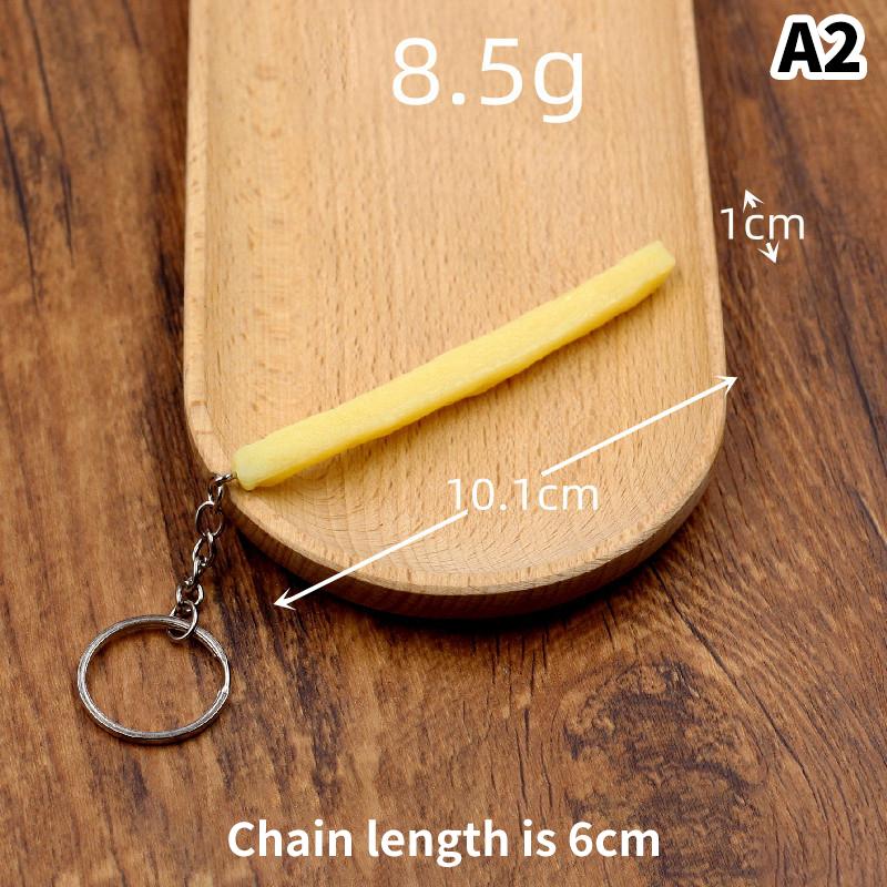 Lustiger gebratener Hühnerbein-Hühnerflügel-Schlüsselanhänger, kreativer Mini-Simulations-Lebensmittel-Anhänger mit Schlüsselring für Handtaschen-Geldbeutel-Zubehör