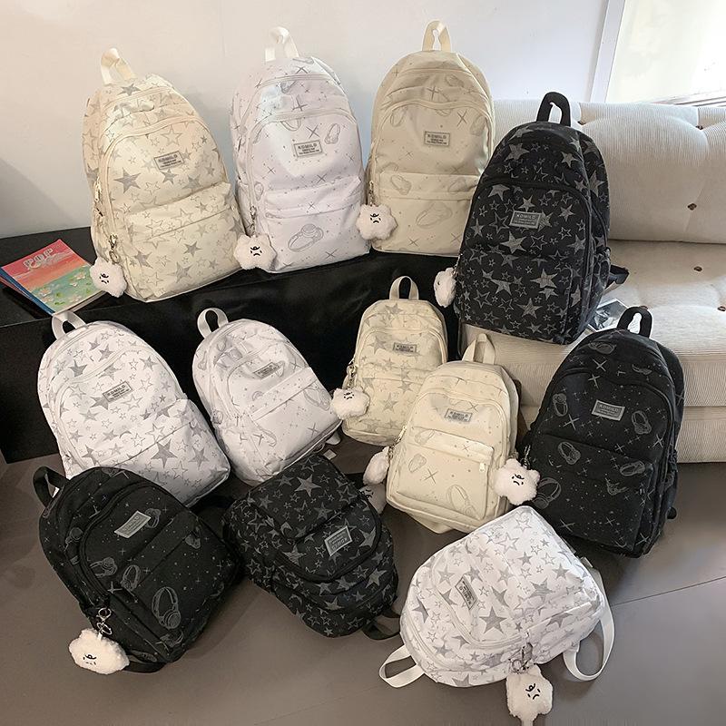 Japanese schoolbag girls junior high school students cute star backpack large capacity leisure male college students travel backpack tide