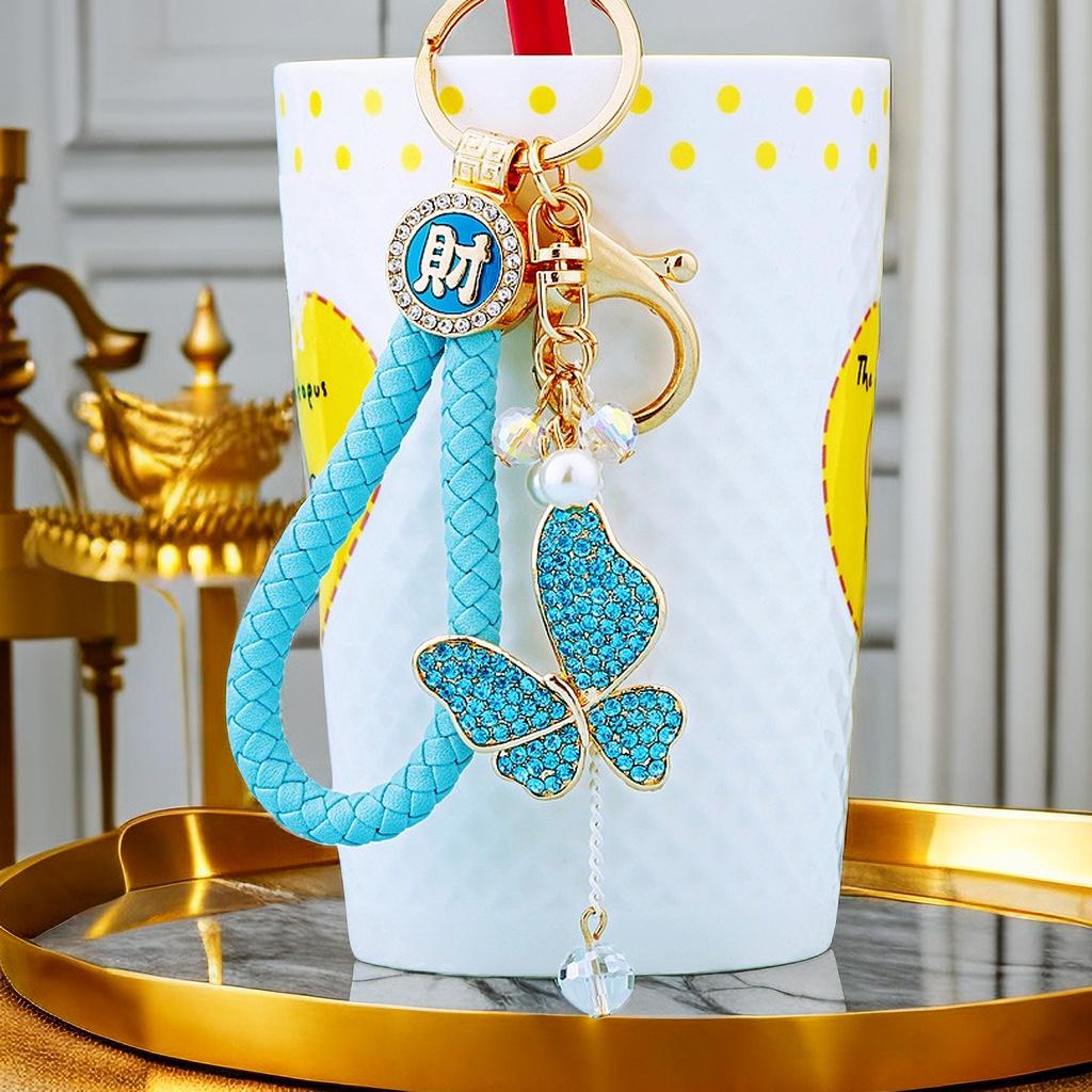 Cute Pearl Adorned Keychain With Vibrant Butterfly Design Ideal For Gift Giving Occasions