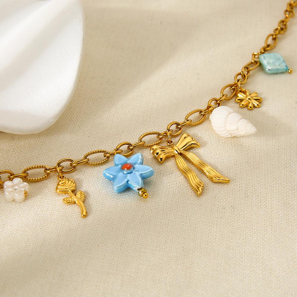 European and American Beach Vacation Wind Conch Bow Flower Fringed Pendant Necklace Stainless Steel Plated 18k Jewelry