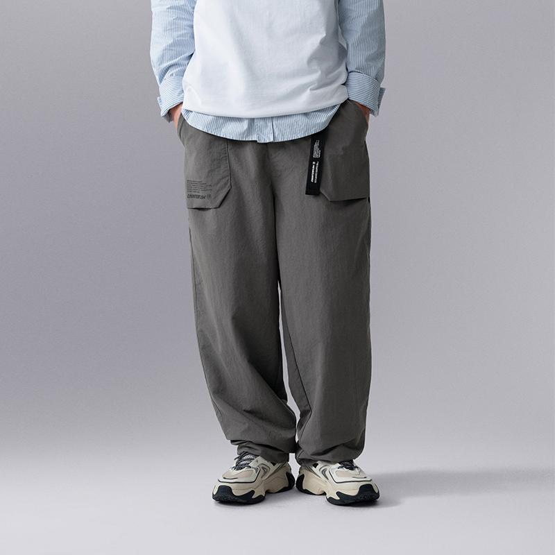 Li Ning CF Su Series Solid Color Mid Waist Straight Loose Knitted Sports Pants Men Pants AYKU621-1