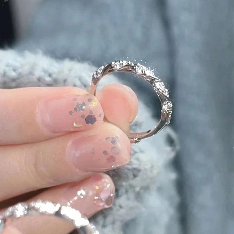 

A minimalist, elegant, adjustable, understated luxury ring for women; size adjustable.