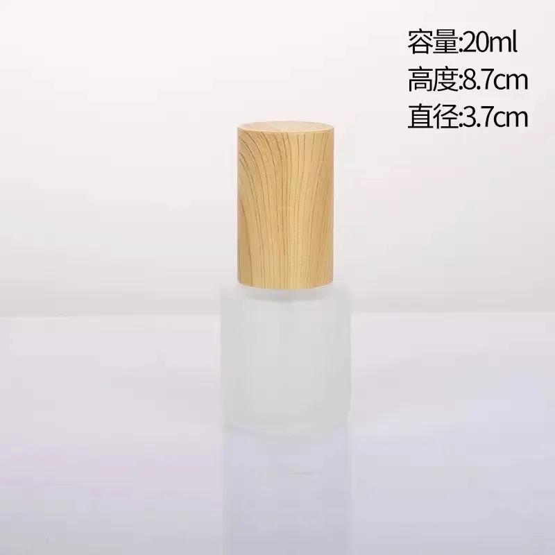 Wood Grain Frosted Glass Bottle with Pump Spray, Refillable Lotion Cosmetic Container for Travel Serum Essentials