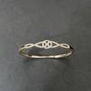 Women's Gold-Plated Copper Bracelet with Rhinestones and Twisted Knot Design