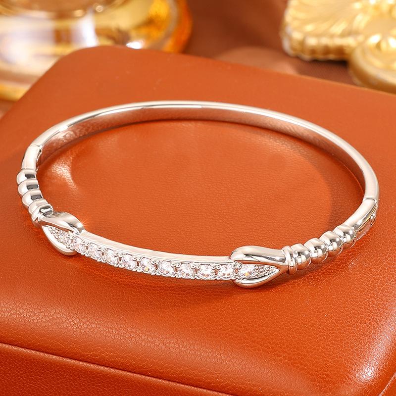 Light luxury copper gold-plated non-fading , personalized light luxury double-knot zircon , fashionable versatile