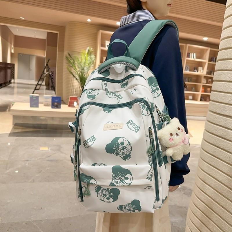 

Spacious Waterproof Nylon Commuter Backpack With Adorable Bear Pendant Blue