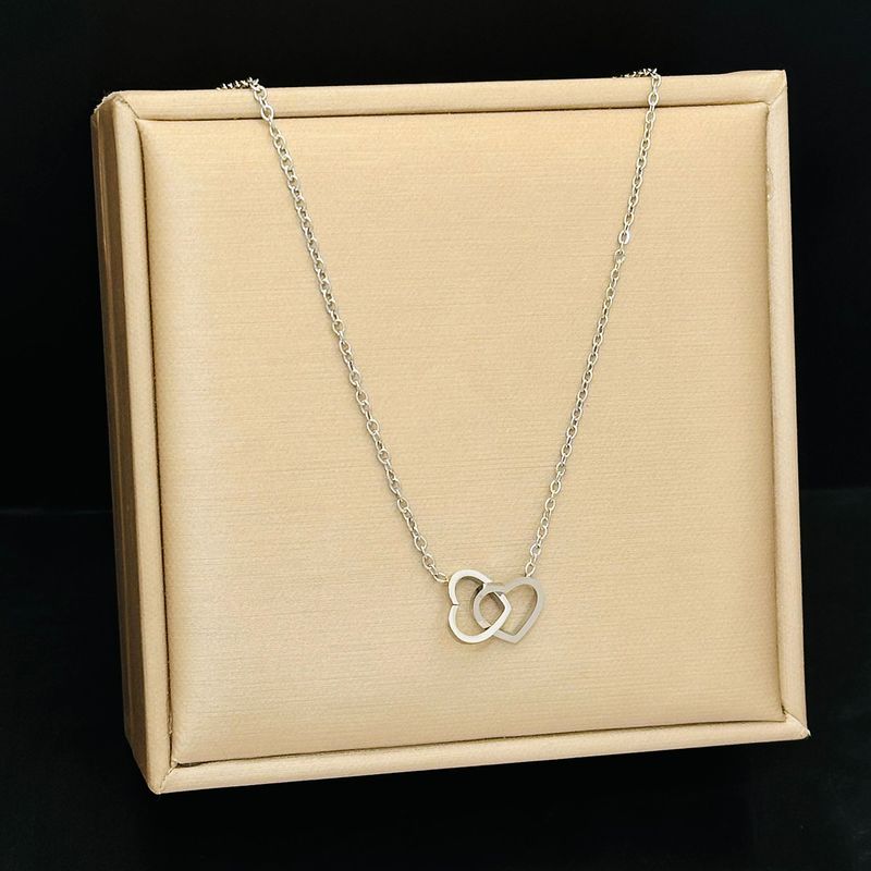 

Женский титановый кулон в форме сердца, благородный, не выцветающий [96141] double heart-shaped steel color