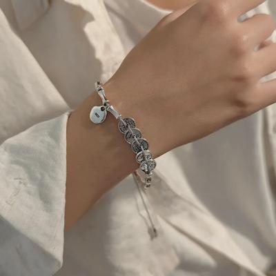 Chinese Emperor Coin Bamboo Tassel Bracelet: Retro, Elegant, and Unique.