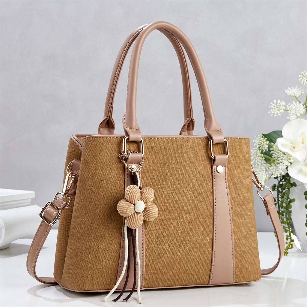 Simple commuting classic flower tassel decorative handbag new gentle temperament crossbody shoulder
