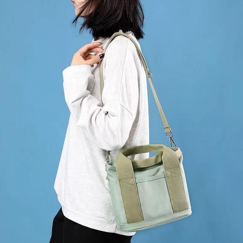 Canvas bag Portable messenger bento bag Large capacity bag Fashion trend One shoulder messenger women's bag