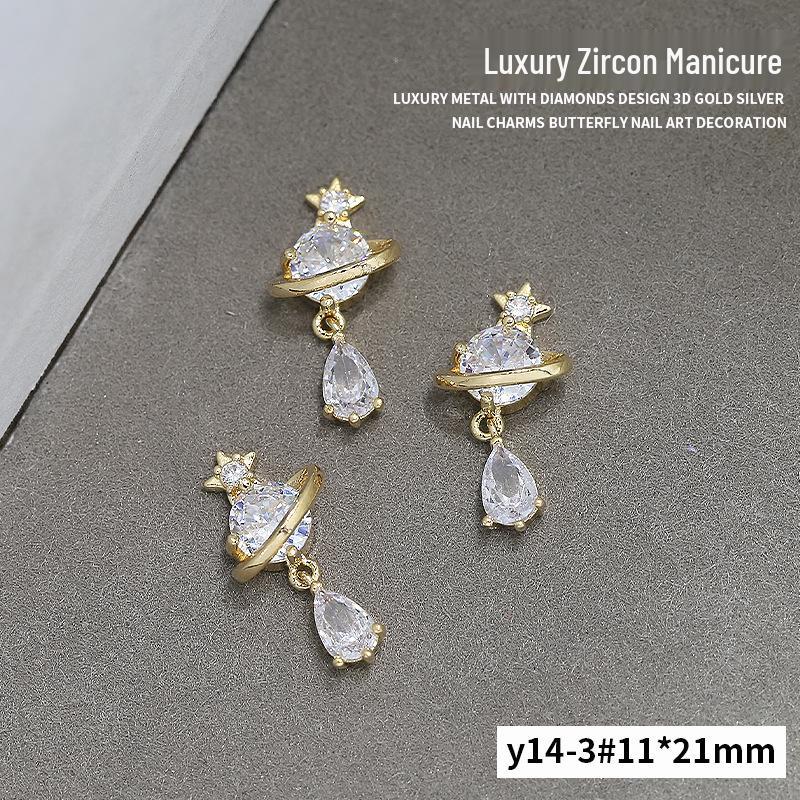 

Xiaohongshu Цирконієві Манікюрні Аксесуари: Розкішна прикраса для нігтів Метелик і планета з діамантовим ланцюжком-підвіскою