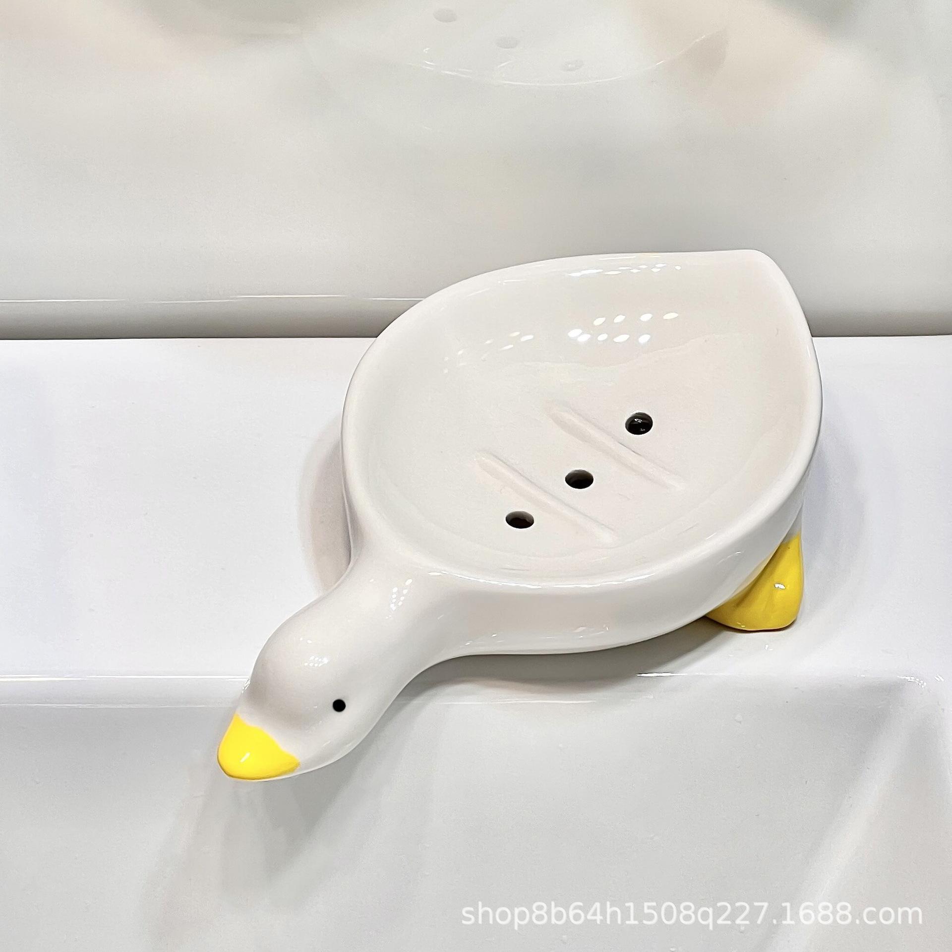 

Милая мыльница в виде утки не накапливает воду, сливает воду в раковине в ванной, не пробивая мыльницу, мыльницу