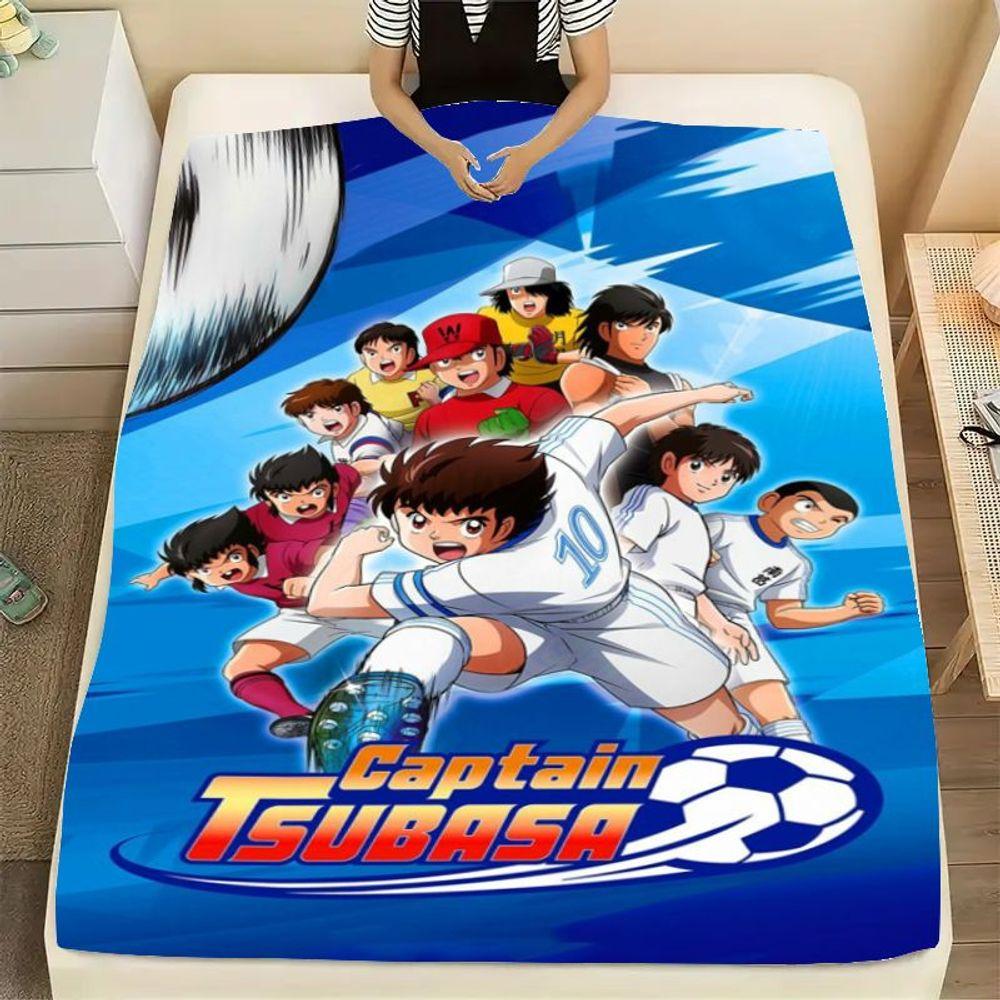 Dynamische Captain Tsubasa Fußball Anime Decke - Lebhaft blaue und weiße weiche Überwurfdecke mit ikonischen Charakteren in Aktion P