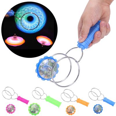 Létající disk kreativní barevné světelné ruční rotující magnetické světelné hračky pro děti