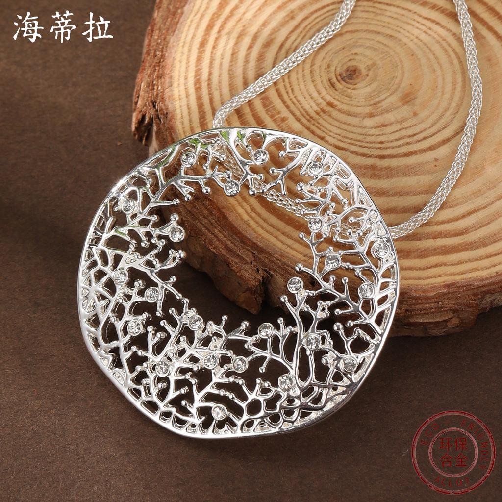 New round hollow irregular coral pendant women's high sense diamond-set geometric coral necklace