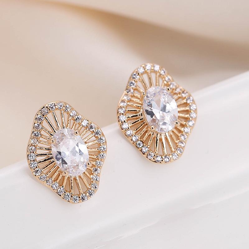 European  American Floral Hollow Design Stud Earrings with Geometric Diamond Inlay