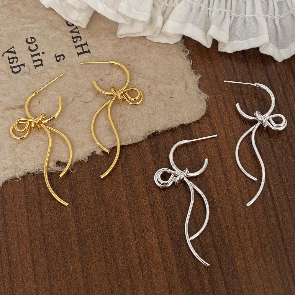 Trendy European & American Bow Pendant Stud Earrings with Tassels