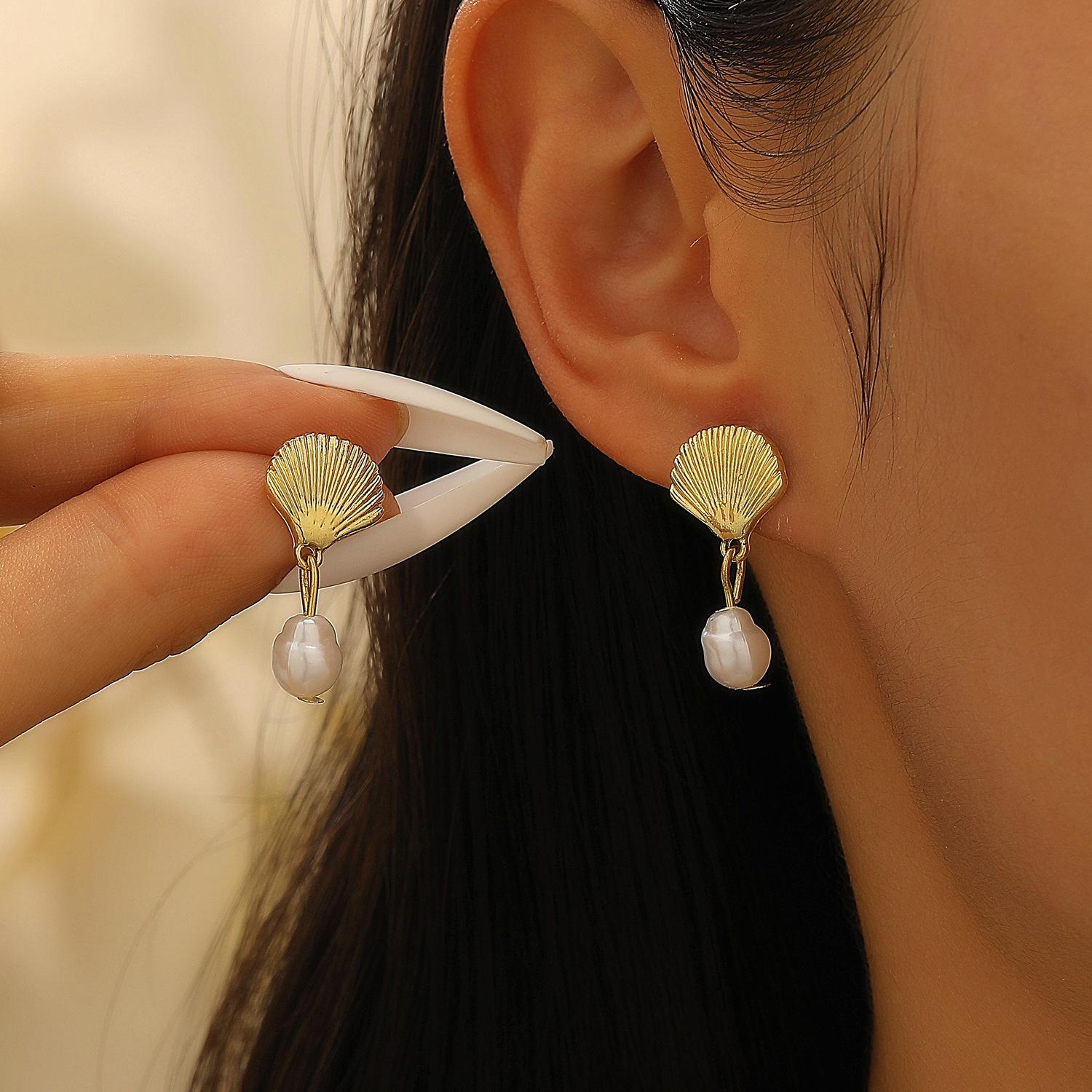 

2026 литературный темперамент океанский стиль сплав маленькие высококачественные серьги-пусеты в виде морской звезды женские серьги-капли с имитацией жемчуга пляж