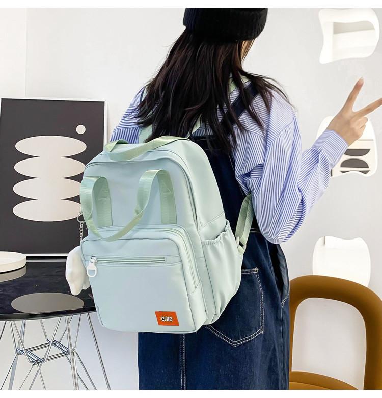 Unisex Primary School Student Backpack Waterproof Handbag With Colorful Patchwork Design