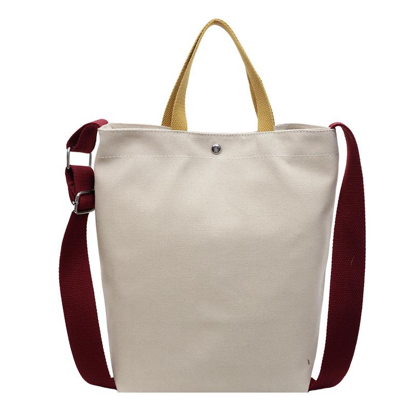 Simple canvas bag, men's and women's tide large-capacity portable shoulder bag, casual student class messenger bag