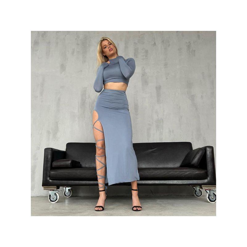 Xiaoke Wiwi European and American Ins Style Sexy Temperament Hollow out Long sleeve Top Irregular Skirt Fashion Two-piece Set