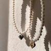 Niche design sense light luxury pearl necklace, fashionable and simple gold and silver love pendant pearl collarbone chain