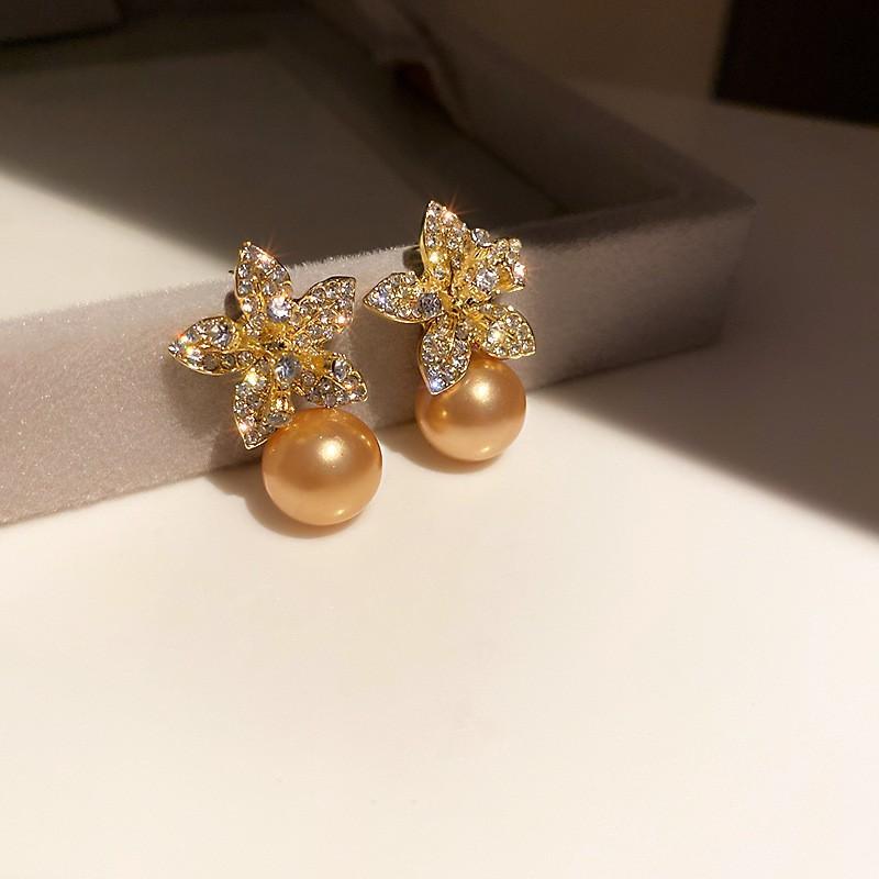 Silver needle zircon butterfly pearl earrings niche design light luxury stud earrings French high-end retro earrings wholesale