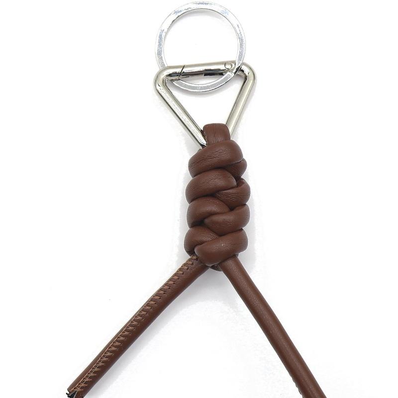 Кожаный плетеный брелок для ключей автомобиля 2025 Правильное издание Высококлассный держатель для ключей Подвеска для ключей автомобиля Роскошное кольцо для ключей Аксессуар