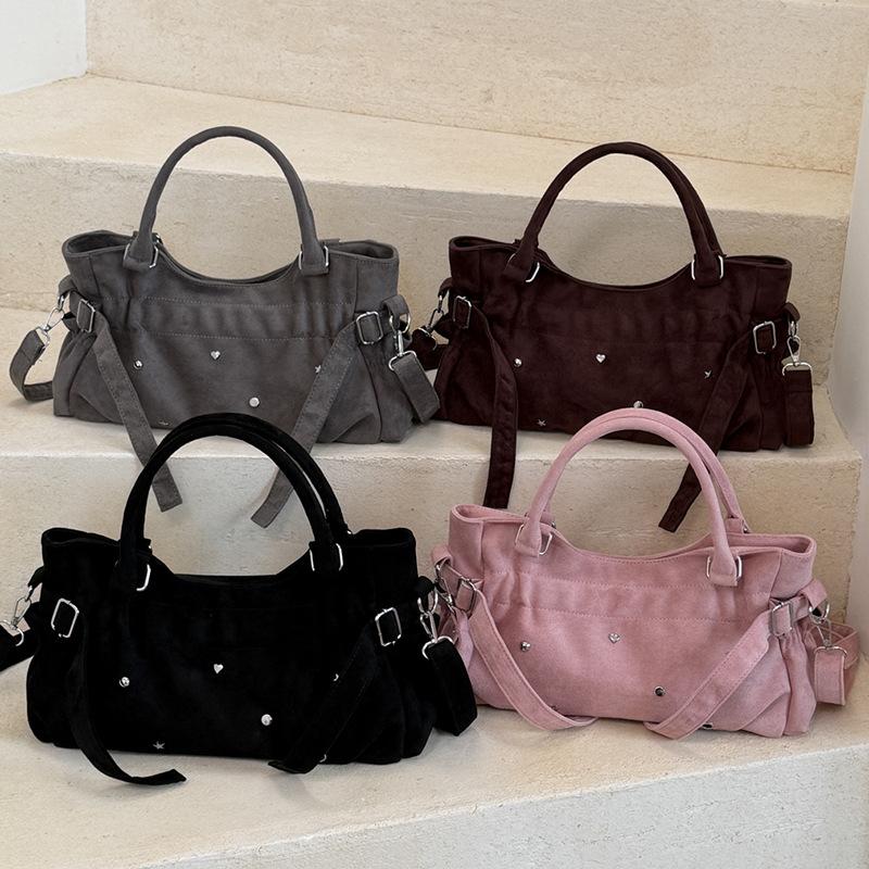 Motorcycle-style Bag with A Lady's Crossbody Strap for Commuting, A Shoulder Bag, and A Tote Bag.