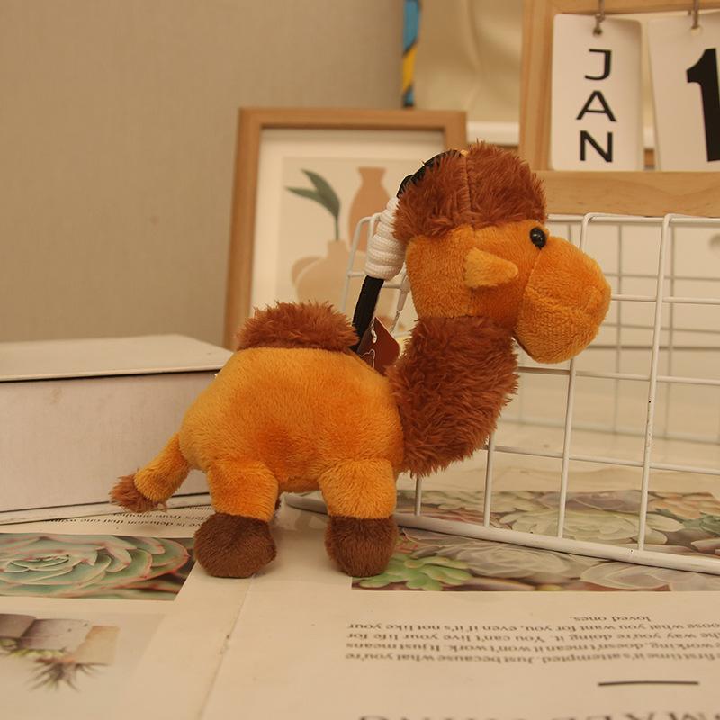 Niedliche Wüstenglocke liegendes kleines Kamel Anhänger Plüschtier Puppe Taschenanhänger Schlüsselanhänger Plüschpuppe