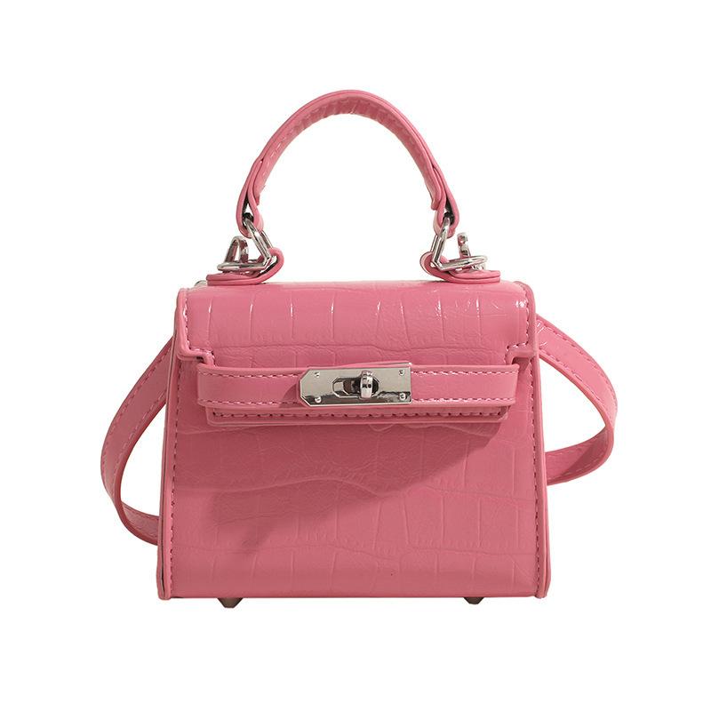 

Bag women s 2025 spring and summer new high-end fashion hand carry mini simple temperament Kelly bag versatile shoulder bag no pendant розовый
