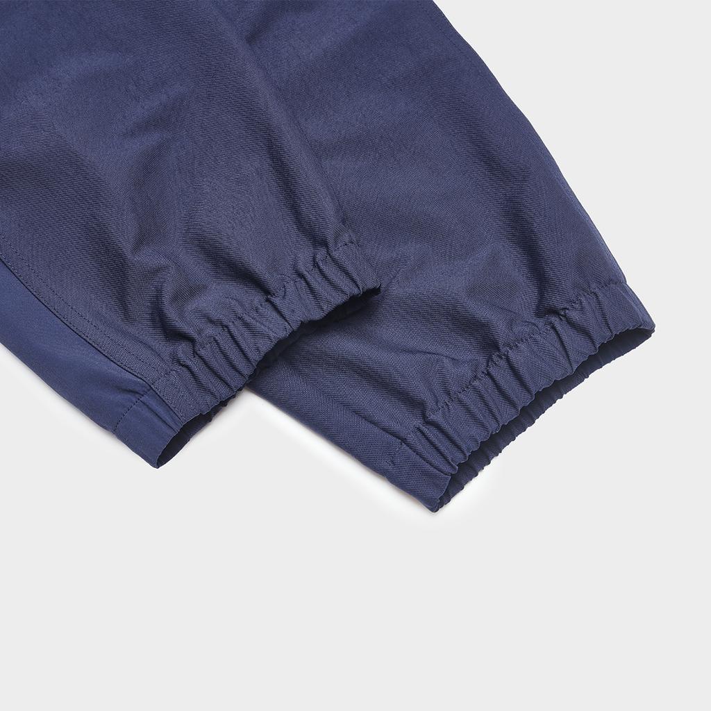 Fila Einfarbige konische lässige gewebte gestrickte Sporthosen Herren Hosen Tiefblau F11M419804F-NV