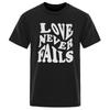 Love Never Fails Retro Groovy Text T-Shirt