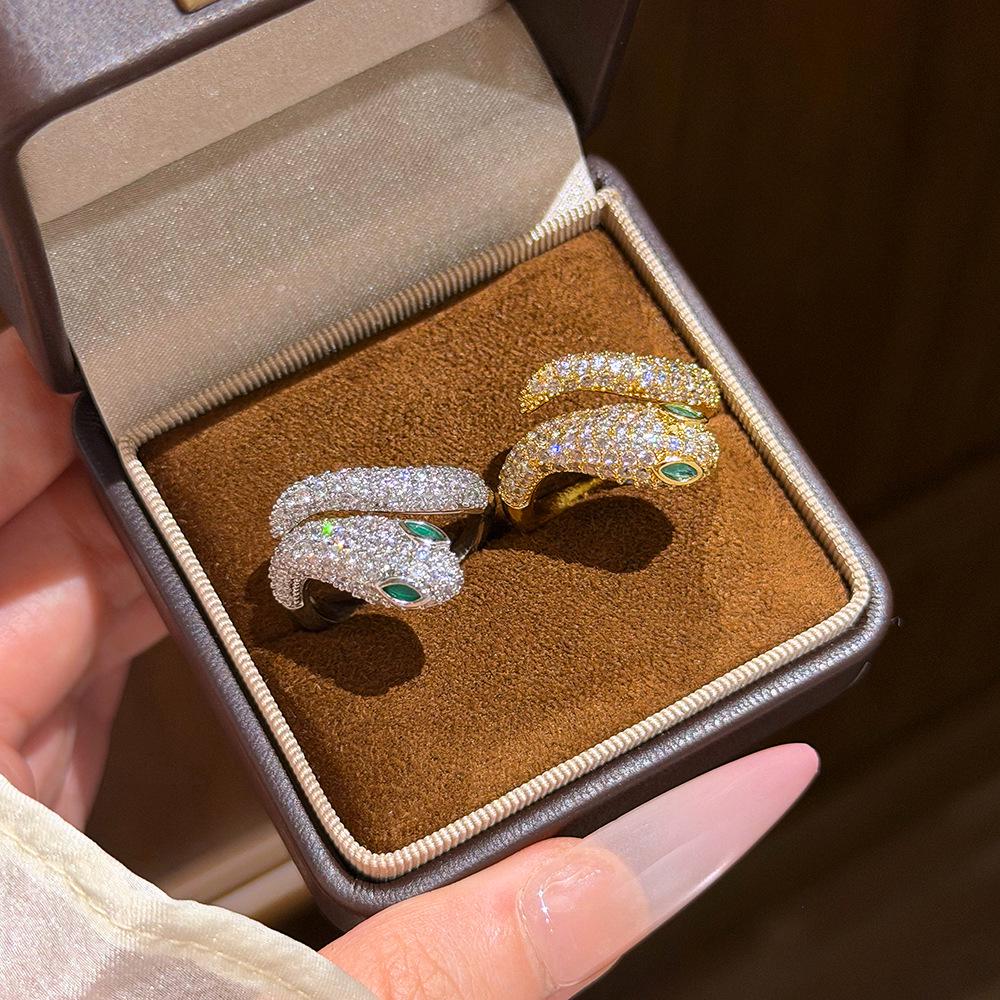 Korean Elegant Snake Ring: Luxurious Full Diamond with Green Eyes and Zircon Inlay for Women.