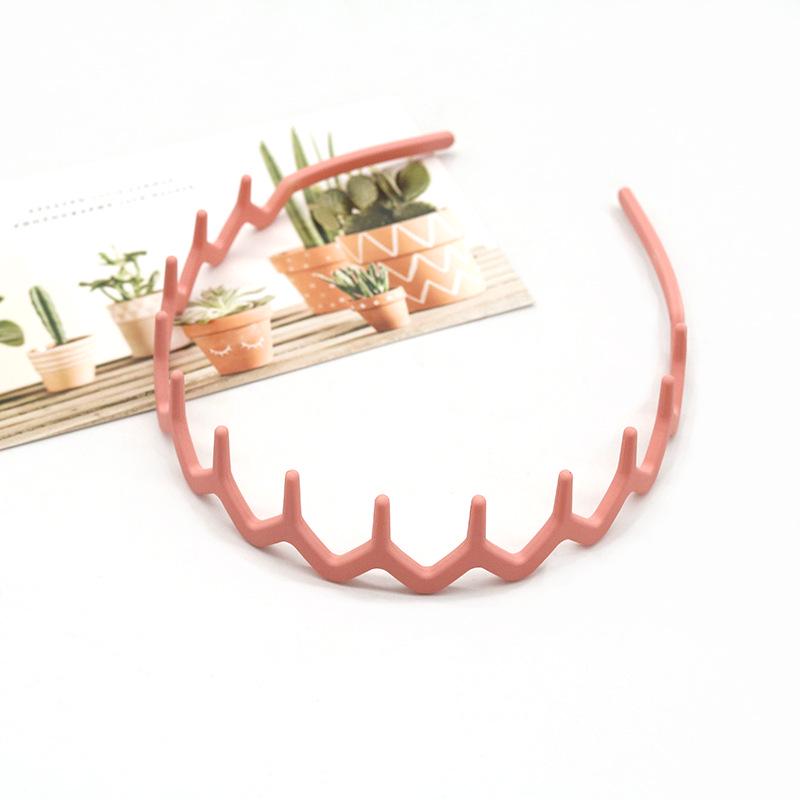 Buntes, wellenförmiges koreanisches Zahnkamm-Haarband - Rutschfest, schonend zum Haar, Bequemer Sitz, Ideal zum Bändigen von Babyhaaren.