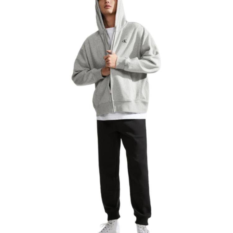 

Calvin Klein Ck Jeans Ss24 Casual Solid Color Patch Drawstring Knitted Joggers Men Joggers Space-Black J325000-BEH M
