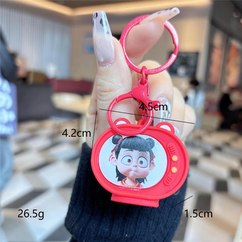 Nezha Luminous TV Keychain with Light - Student Backpack Pendant Ornament.