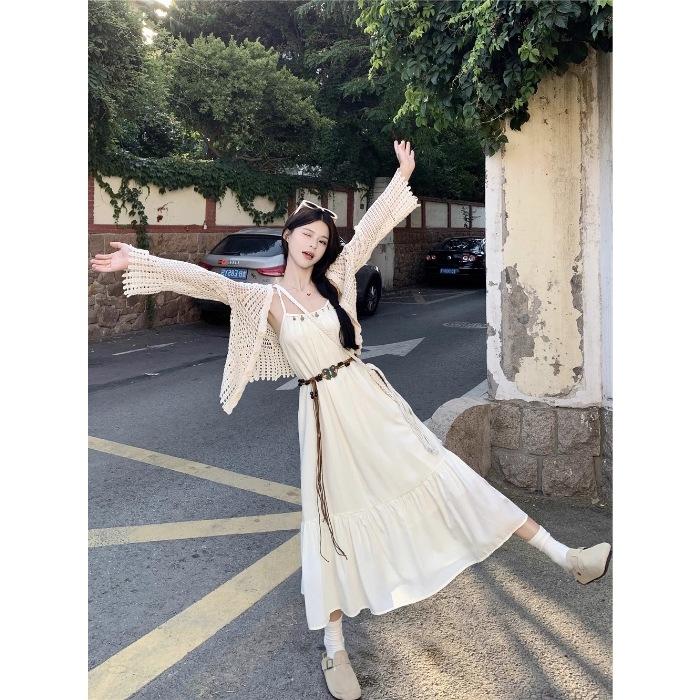 Seaside vacation style suit temperament waist suspender dress women's summer knitted hollow cardigan top two-piece set
