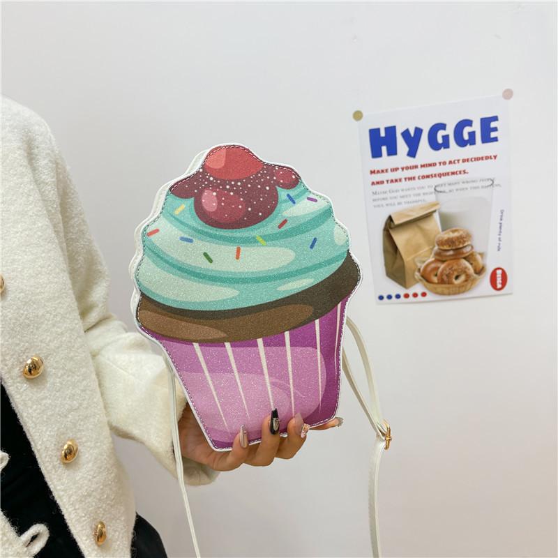 

Bags cartoon small bag 2025 new Mori sweet girl funny personality cake shoulder crossbody small round bag фіолетовий