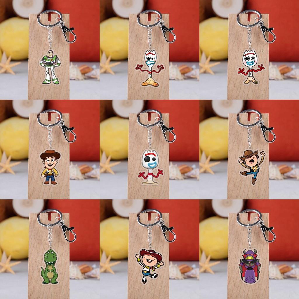 Entzückender Toy Story Acryl-Schlüsselanhänger mit Buzz Lightyear, Woody und Alien Design