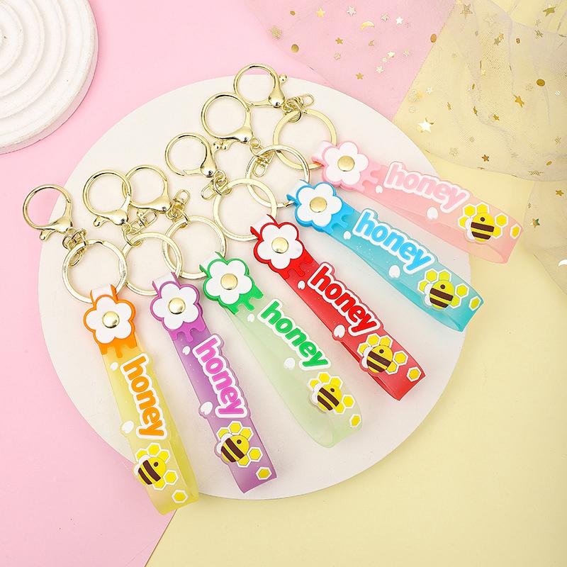 Transparent Pvc Soft Rubber Rope Keychain English Small Flower Jelly Color Plum Blossom Candy Color Drop Adhesive Wristband