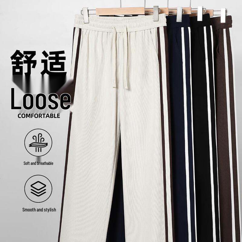 Pánské tepláky Jeanswest s širokými nohavicemi a potiskem těžkého žinylkového písmene