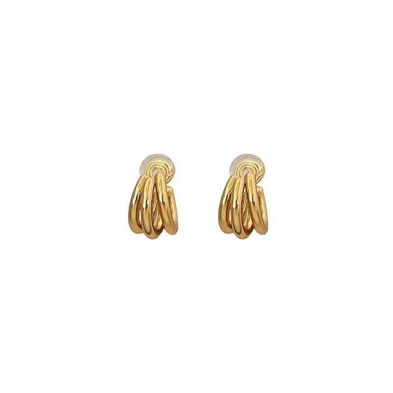 Retro curved metal sense mosquito coil disc ear clips without ear holes, women's high sense niche temperament versatile circle earrings