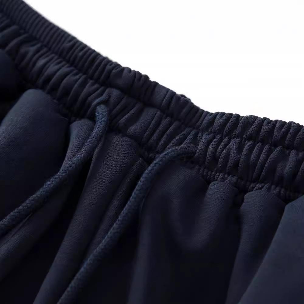 Unisex pruhované volné tepláky - Módní, prodyšné a ležérní kalhoty s rovnými nohavicemi