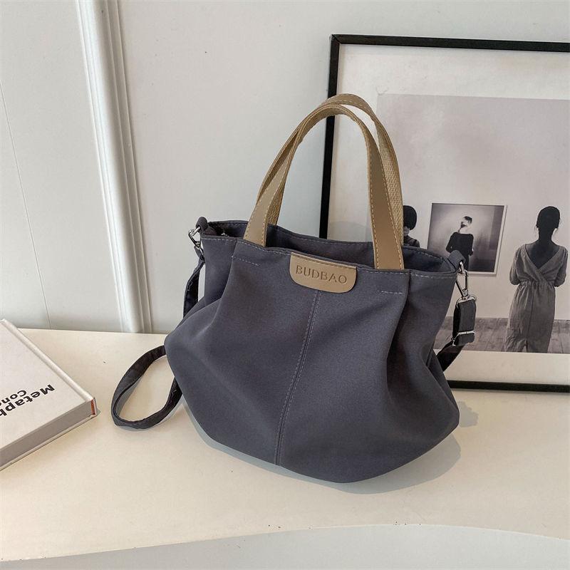 Casual canvas bag women's new versatile simple shoulder handbag fashionable large-capacity student class shoulder bag