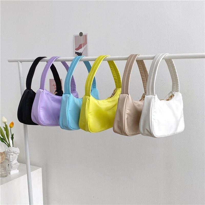 Trendy Urban Minimalist Small Nylon Handheld Bag For Women Available In Elegant Shades