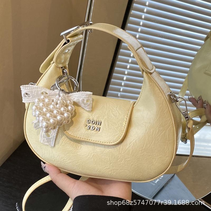 Super fire small bag women 2025 new hand carry crescent bag commuter messenger bag one shoulder armpit dumpling bag